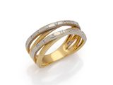 a gold and silver ring with diamonds