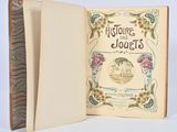 un livre ouvert sur lequel figure l'image d'un bateau