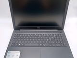 a close up of a laptop computer on a white surface