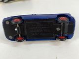 a small toy car that is sitting on a table