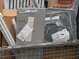 a metal basket with a lot of items in it