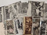 a lot of old photos that are on the table