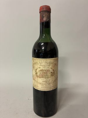 a bottle of wine that is sitting on a table