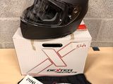 a helmet on top of a box on a table