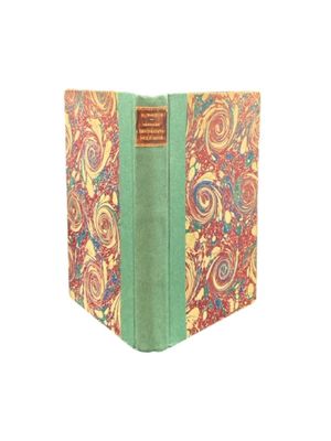 an image of a book with a green cover sitting on a white surface