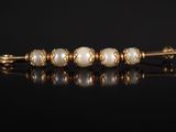 Bracelet en or jaune 14 carats avec des perles et des diamants