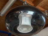 a light that is hanging from the ceiling in the room
