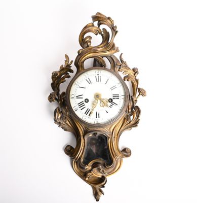 a clock that is hanging on the wall on the wall