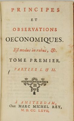 un vieux livre dont le titre est écrit en noir et rouge