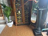 a lamp that is on a stand in a room
