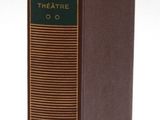 the book is brown and has a green cover on it