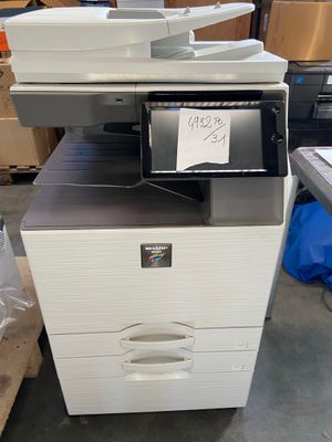a printer that is sitting on top of a table
