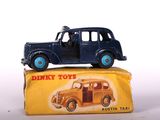 a small toy car sitting on top of a box