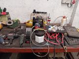 a table with a lot of tools and tools on it