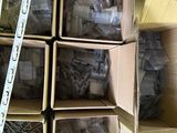 many boxes of assorted electronic components in a room