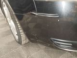 a close up of a car that has been dented