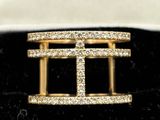 an image of a gold ring with diamonds on it