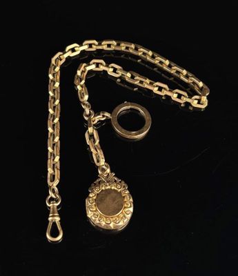 a close up of a gold chain with a locke on it