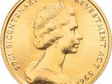 an image of a close up of a gold coin with a woman ' s face