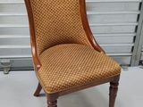 a chair that is sitting on the floor in front of a garage door
