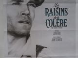 On voit l'affiche du film « Raisins de colère ».