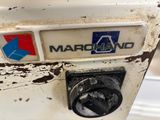 a close up of a parking meter with the name marcland on it