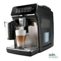 an image of a coffee machine with a cup of coffee in front of it