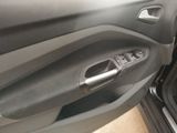 a close up of a car door handle with the door handle open