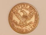 an image of a gold coin with an eagle on it
