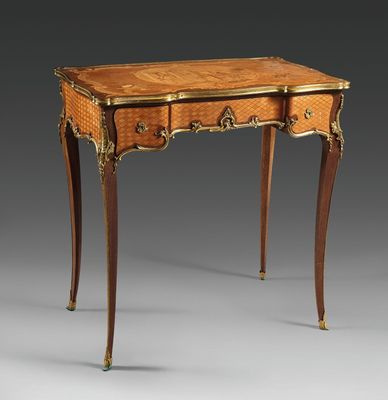 an antique writing table with two drawers and a drawer underneath it