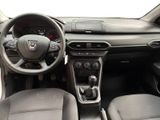 the interior of a car with a steering wheel, dashboard and dashboard controls