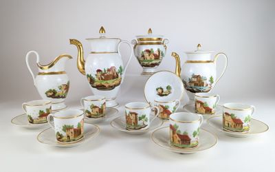 de nombreuses tasses et soucoupes posées sur une table
