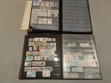 a lot of stamps on a folder on the table
