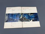 un livre sur lequel figure l'image d'un train