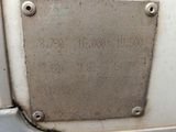 a metal plaque on the side of a train car