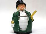 a figurine of a man holding a baseball bat