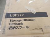 a cardboard box with a label on it that says storage ottoman