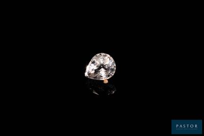 a white diamond on a black background