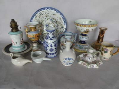 many different types of vases and dishes on the table