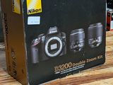 a box of cameras sitting on a table in a room