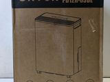 packaging of a box with a picture of a toaster inside of it