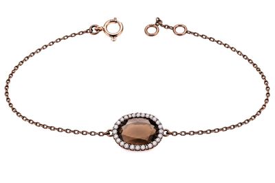 a bracelet with a brown stone and white diamonds on a chain
