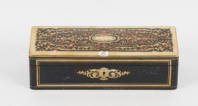 an image of a black and gold box on a white surface