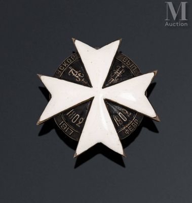 an image of a white and black badge with a star on it