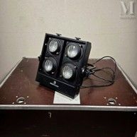a black light that is on top of a brown box