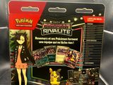 a box of pokemon trading cards with a picture of a girl in a dress