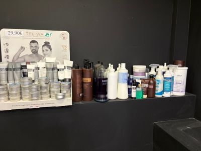 many different types of skin care products displayed on a shelf