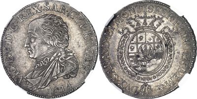 a close up of a silver coin with a picture of a man on it