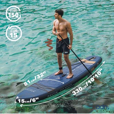 a man that is standing on a surfboard in the water