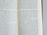 a open book that is sitting on a table
